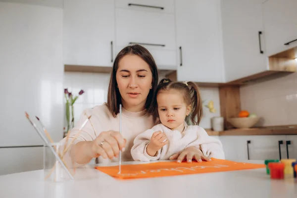 stock image Happy mother's day. Child daughter congratulates moms and gives her a postcard