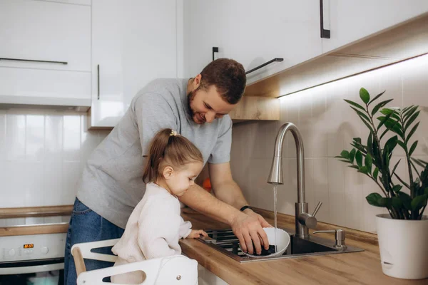 Father Daughter Wash Dishes Kitchen Sink Dad Teaches Kid Wash — Stock Photo, Image