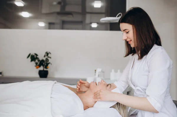 Woman Beautician Applies Cream Face Massage Care Relaxation Rejuvenation Nourishment — Fotografia de Stock