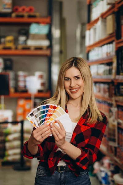 Beautiful Young Woman Choosing Paint Colors Brushes Hardware Store Hobby — Stock Photo, Image
