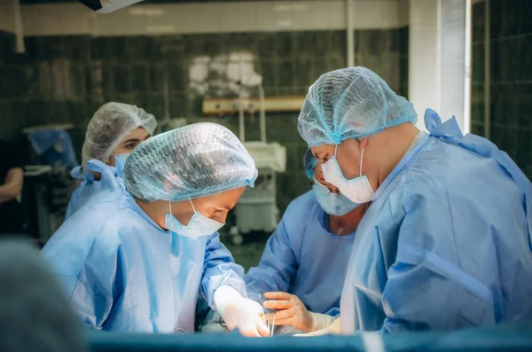 stock image a group of doctors during cesarean births