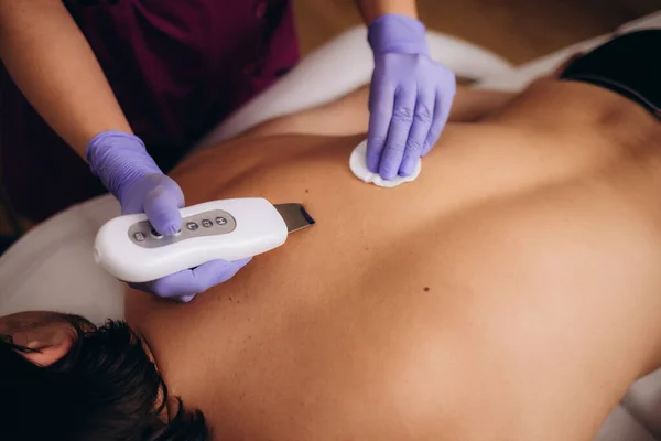 Permanent hair removal at beautician's with laser therapy. High quality photo
