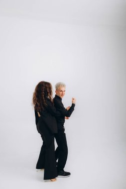 Couple dancing social dance. Kizomba bachata or semba salsa or taraxia on white background with copy space banner and place for text - Social dance concept.