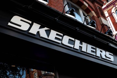 London, UK - August 1, 2018: Illustrative Editorial Photograph of Skechers Store Signage, Global Footwear Retailer's Covent Garden Location in Historic Building clipart