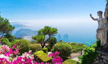 View of sea and garden from mount Solaro of Capri island, Italy, web banner with flowers