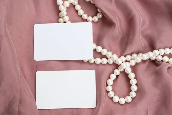 Pearl Jewellery Pink Silk Styled Stock Scene Wedding Invitation Product — Zdjęcie stockowe