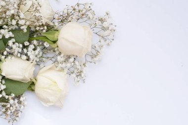 wedding or mothers day background, bouquet over white background, border with copy space