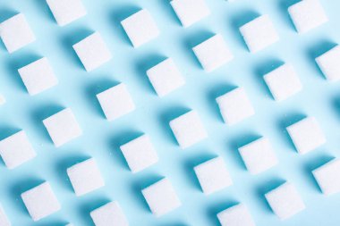 Mavi arka plan, düz yatıyordu sahne üzerinde şeker küpleri şekli