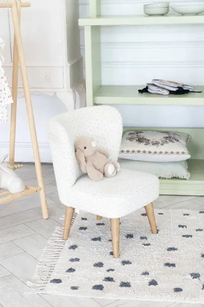Interior of childrens room in neutral pastel colors