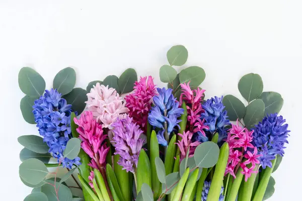 wedding or mothers day background, bouquet of Hyacinth flowers over plain background