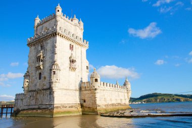 view of Torre of Belem at sunny day, famouse landmark of Lisbon, Portugal clipart