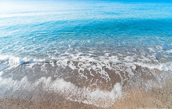 Steinstrand Und Türkisfarbenes Wasser Der Cote Dazur Bei Nizza Sommer Stockbild