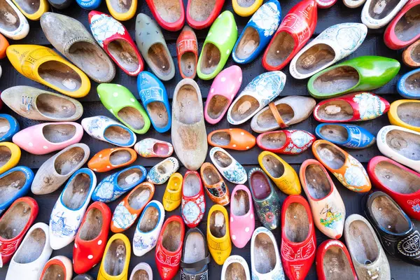 stock image Pile of traditional dutch wooden shoes clogs