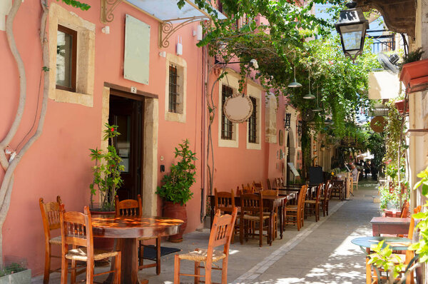 cosy street of Rethymno old town, Crete, Greece, retro toned