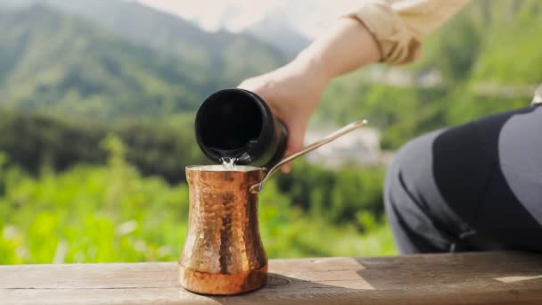 Woman Brew Prepare Coffee Copper Cezve Mountains Add Fresh Water — Stock Video
