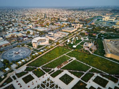 Aerial drone view of caravan sarai old culture centre of city Turkestan at sunset in South Kazakhstan  clipart