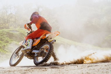 Man riding motorbike on motocross track.Extreme and Adrenaline. Motocross rider in action. Motocross sport. Active lifestyle