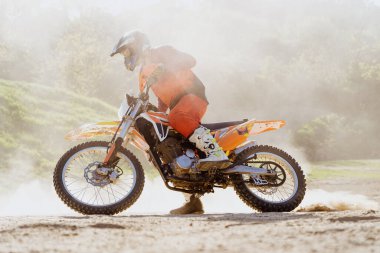 Man riding motorbike on motocross track.Extreme and Adrenaline. Motocross rider in action. Motocross sport. Active lifestyle