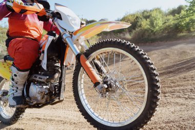 Man riding motorbike on motocross track.Extreme and Adrenaline. Motocross rider in action. Motocross sport. Active lifestyle