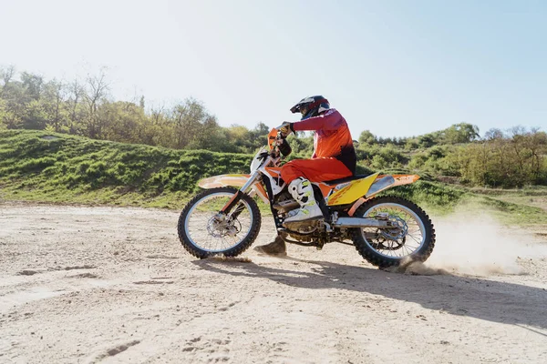 stock image Man riding motorbike on motocross track.Extreme and Adrenaline. Motocross rider in action. Motocross sport. Active lifestyle