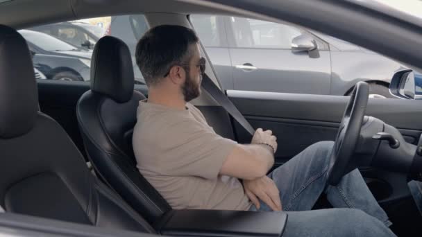 Safety First Young Adult Male Fastens His Seat Belt Driving — Stock Video
