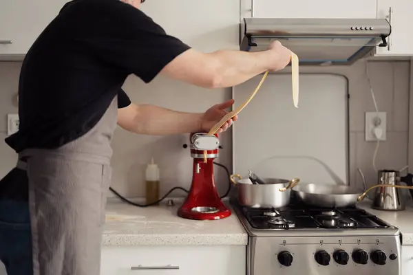 Man Apron Cooking Pasta Modern Kitchen Focus Hand Spaghetti Φωτογραφία Αρχείου