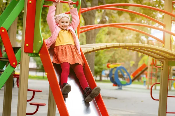 Pretty Girl Kid Playing Playground Autumn Day Outdoors Enjoying Park — Stock Photo, Image
