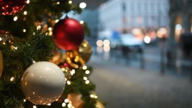 Christmas tree with toys on the street in the city center. On Christmas Eve. New Years City.