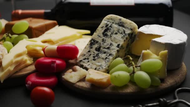 Cheese Plate Bottle Wine Fruits Black Background — Vídeos de Stock