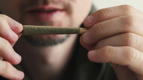 Young Man Holding Marijuana Joint Hands Cbd Cannabis Close — Stock Video