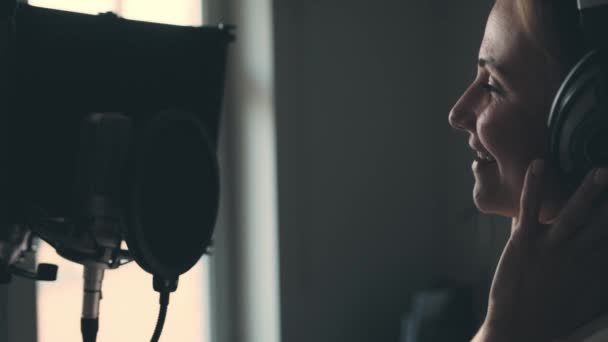 Girl Singing Microphone Wearing Headphones Recording Studio Young Woman Pop — Stock video