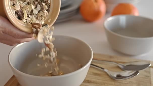 Girl Puts Oatmeal Nuts Fruits Jar Bowl Plate Delicious Cereal — Stock videók