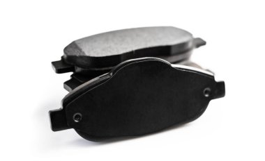 Brake pads for car transportation isolated on white background. Auto spare detail for vehicle repair