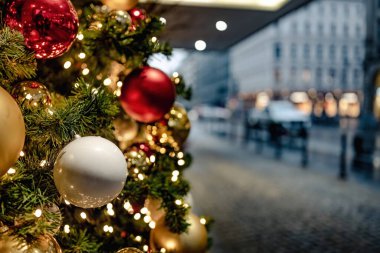Christmas tree with toys on the street in the city center. On Christmas Eve. New Years City.