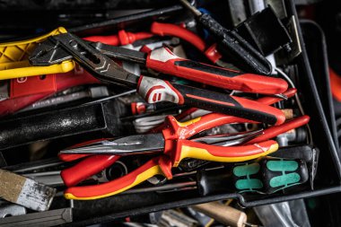 Adjustable wrench, pliers and other work tools service and repairment. Repair equipment for manual repair