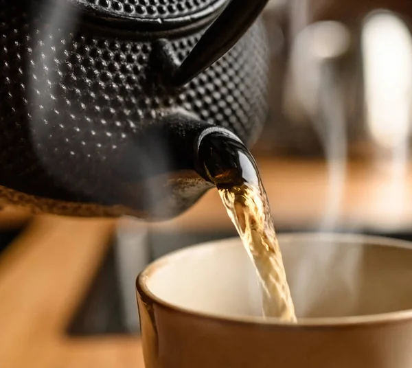 Pouring Hot Black Tea Metal Teapot Kitchen Close Steam Comes —  Fotos de Stock