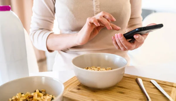 Girl Oatmeal Bowl Smartphone Hands Checking Social Media News Cereal — Stock Photo, Image