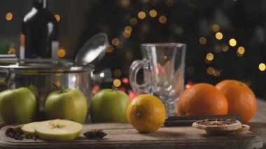 Set of fruits, spices and kitchenware for mulled wine home preparation