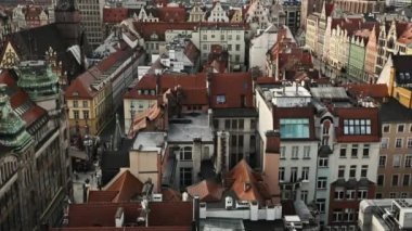 Medieval architecture of Wroclaw city in Poland, view from above to red roofs. Scenic old town in Europe