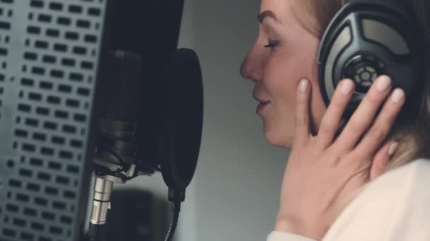 Girl Singing Microphone Wearing Headphones Recording Studio Young Woman Pop — Video
