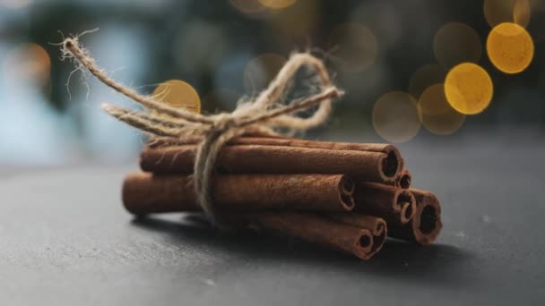 Dried Cinnamon Rolled Sticks Tied Rope Dark Background — 비디오