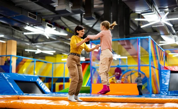 Pretty Girl Her Daughter Kid Jumping Colorful Trampoline Playground Park — Stock Photo, Image