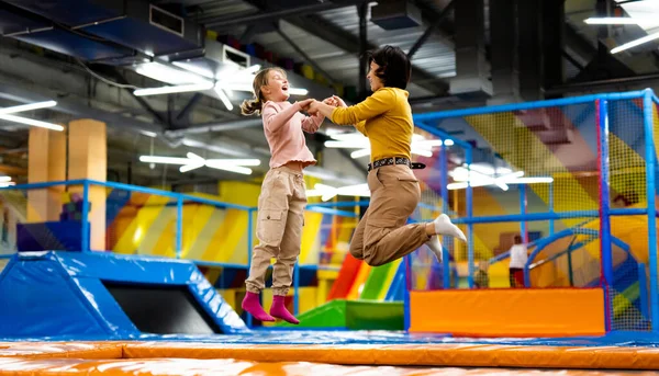 Pretty Girl Her Daughter Kid Jumping Colorful Trampoline Playground Park — Stock Photo, Image