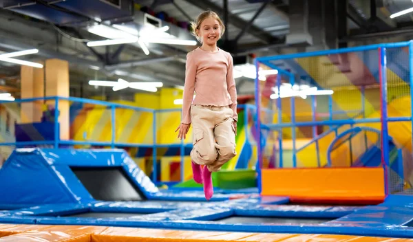 Pretty Girl Kid Jumping Colorful Trampoline Playground Park Smiling Beautiful — Stock Photo, Image