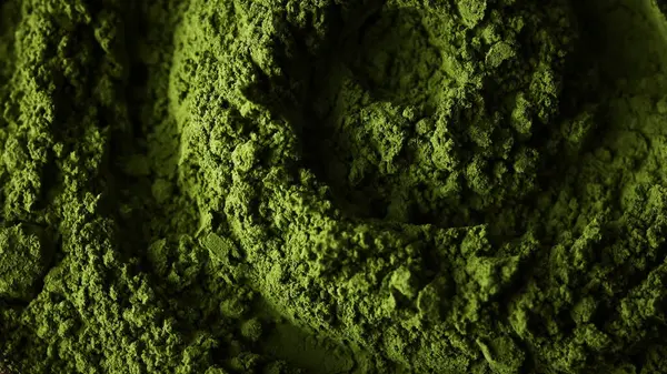 Matcha green tea powder close up top view