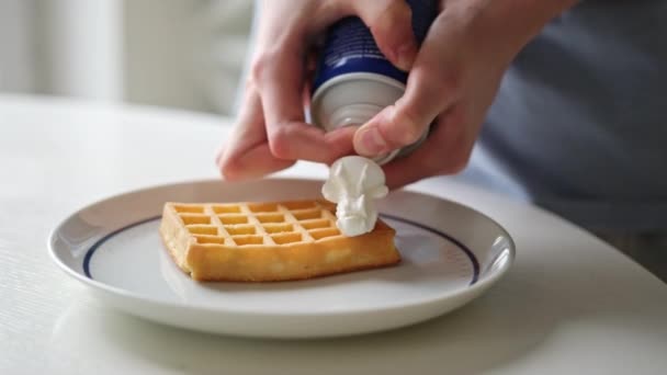 Girl Putting Whipped Cream Belgian Waffle — Stock Video