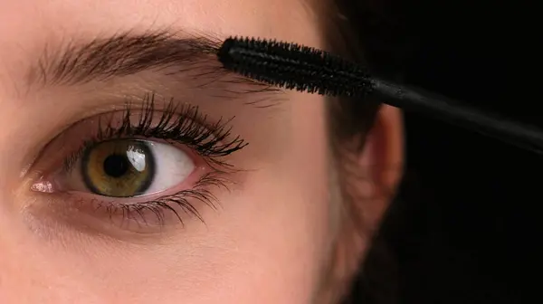 Girl Seen Close Applying Black Mascara Her Long Eyelashes Stock Photo