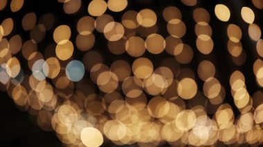 Parlak Altın Çelenk Soyut bir Yeni Yıl Bokeh Arkaplanı ve Gecenin Işığı