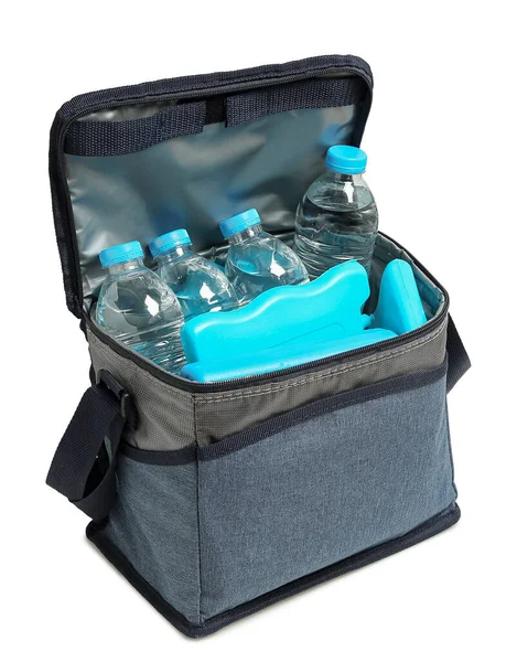 蓝色冷藏袋 装有隔离水瓶 免版税图库照片