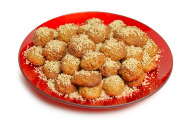 Melomakarona tabakta, Yunan xmas tatlı ceviz ve bal şurubu ile